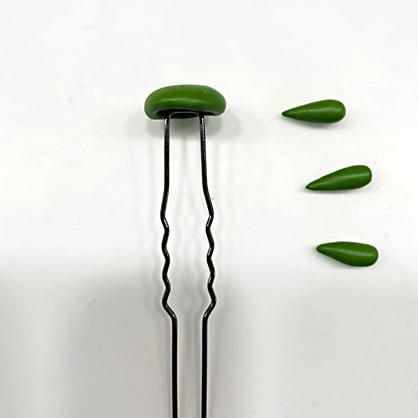 photo shows hair pin and leaves 