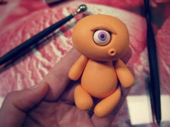 add the head to the body of the polymer clay monster