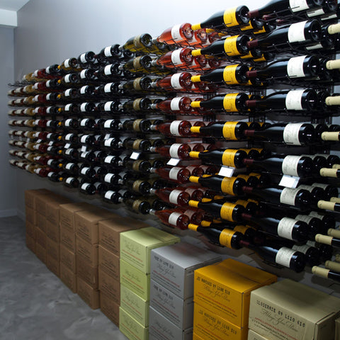 Visio Rack (VisioPlan range) customer image stretching across large wall to showcase hundreds of bottles of wine creating a wine wall