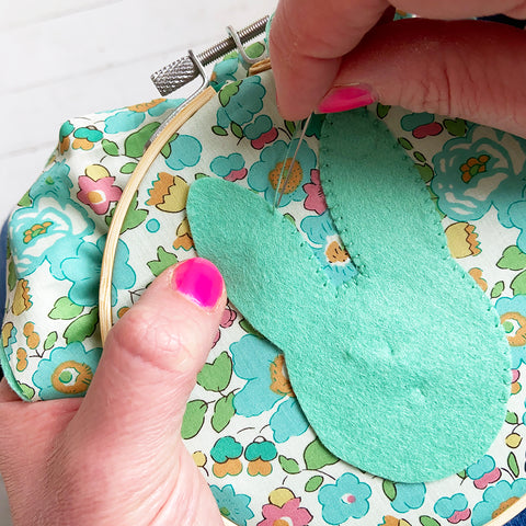 Stitching the felt to the hoop