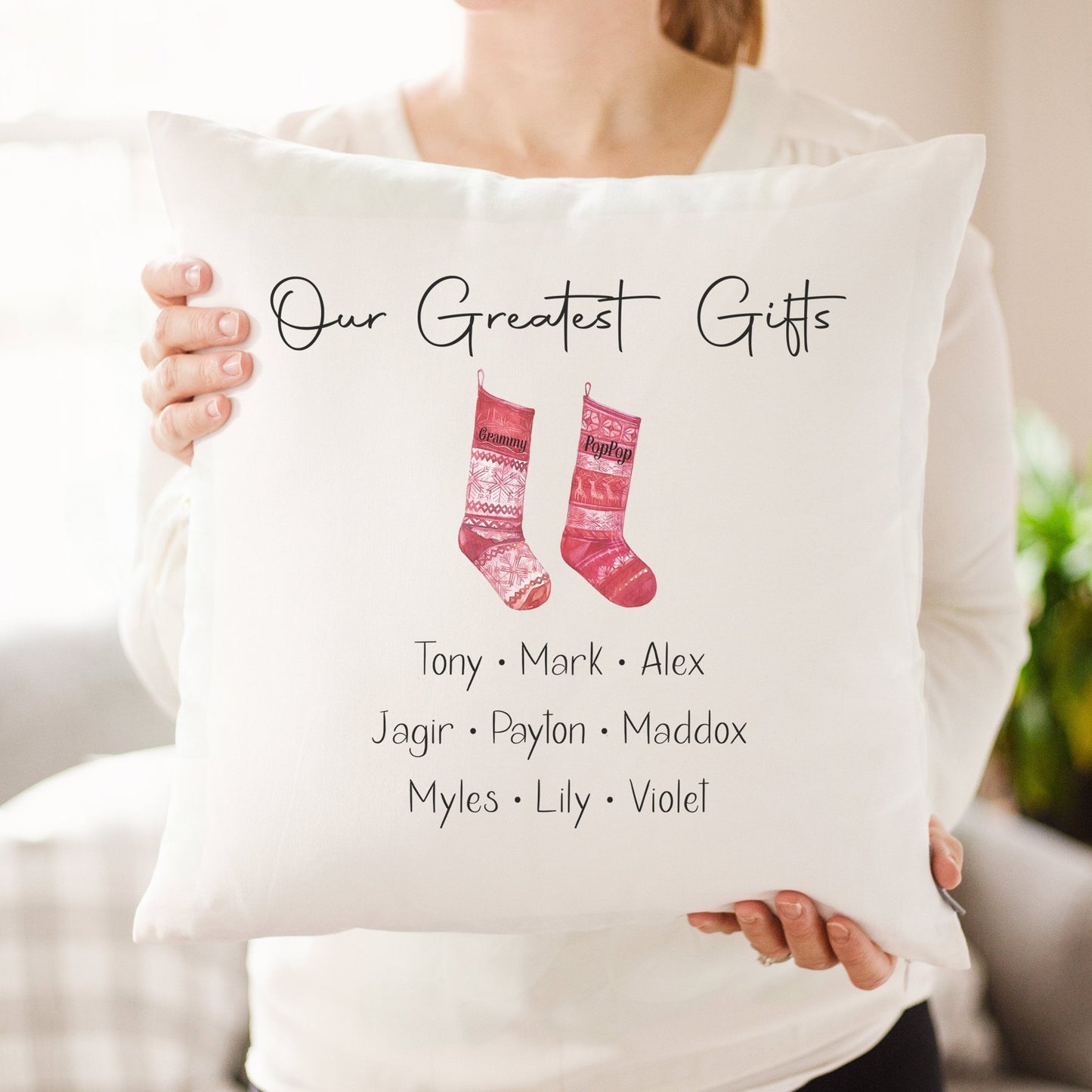 https://cdn.shopify.com/s/files/1/0667/8039/7863/products/our-greatest-gifts-personalized-christmas-pillow-family-custom-stockings-grandparents-gift-gift-for-mom-christmas-decor-gift-747985_1445x.jpg?v=1668884637