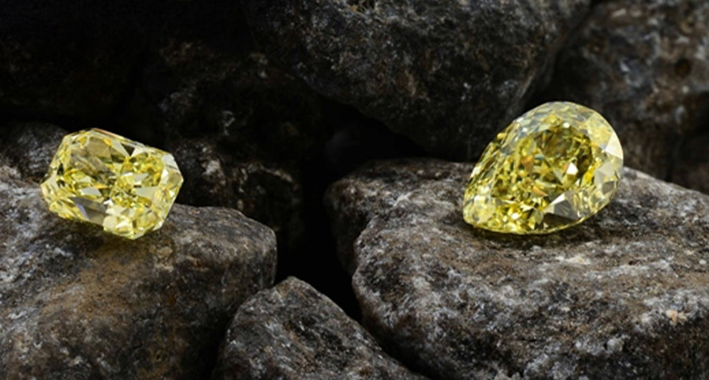 Two Shimansky yellow diamonds on a rock