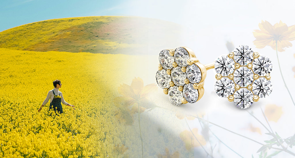 A woman strolls through a vibrant field of yellow flowers, adorned with Shimansky Cluster Diamond Earrings in 14K yellow gold