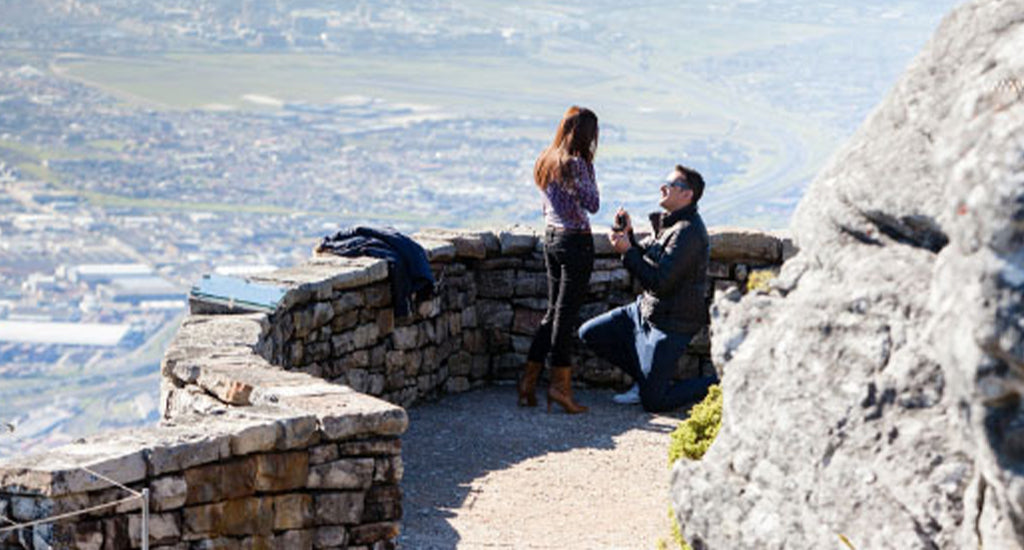 Couple proposing on top of Table Mountain