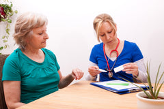 Nurse in a consultation with a patient