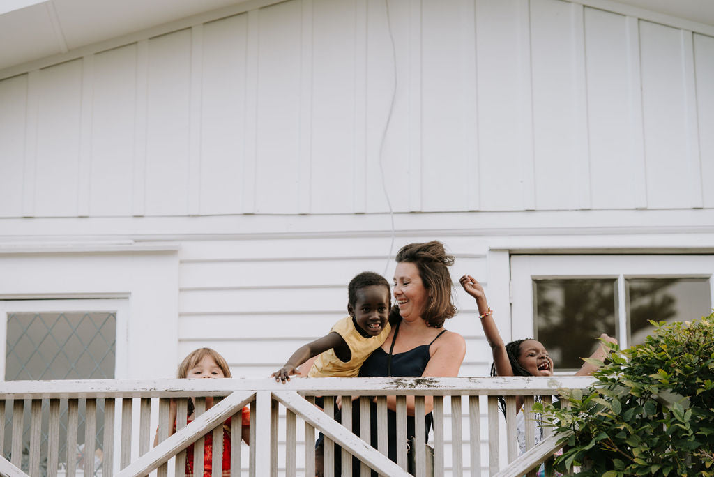 Helen Manson at home with her children