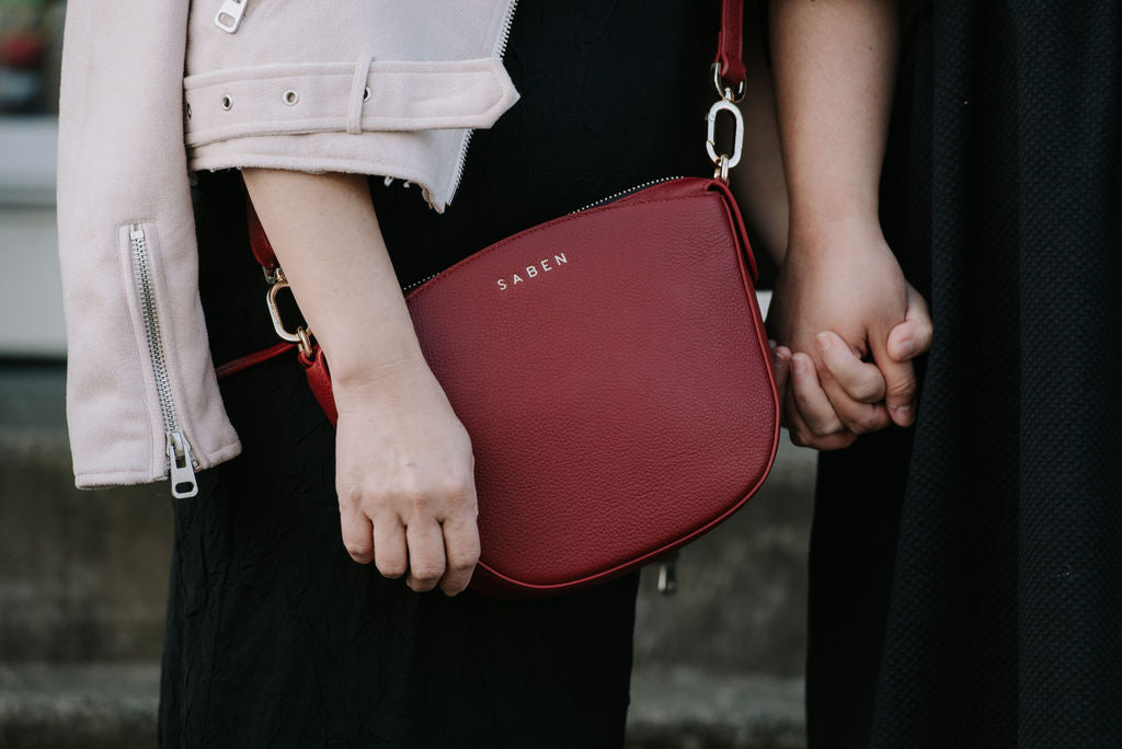 Jess Molina and her mother Florence for Saben Mothers Day campaign - close up of Sye handbag in Rosewood red leather