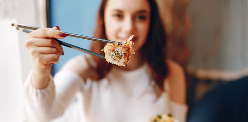 eating using chopsticks