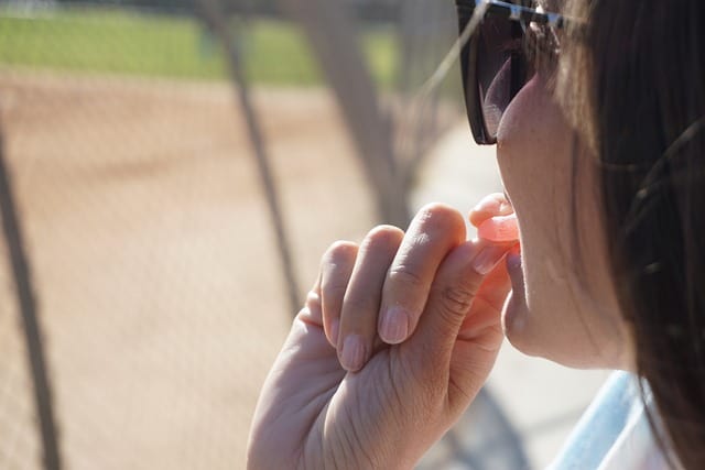 A Woman Enjoying a CBD Gummy