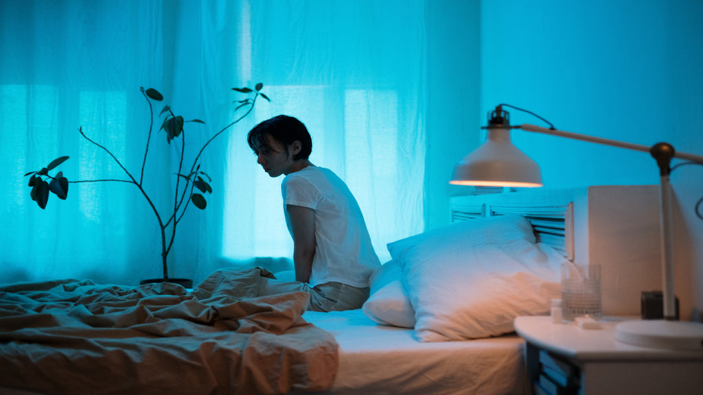 Women sitting on bed