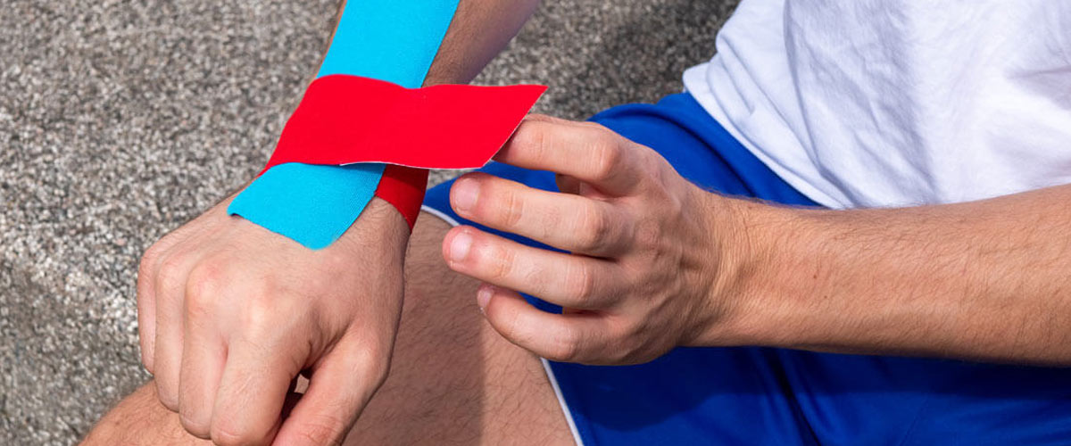 Kinesio tape application. (A) With tension (stabilizing effect): 2