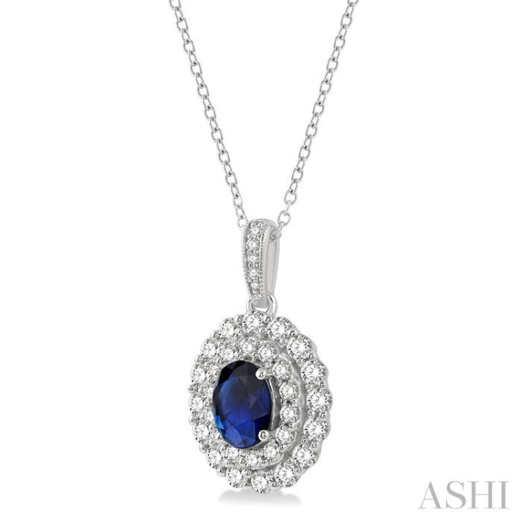 1.26 ctw Oval Blue Sapphire and Diamond Pendant in 14K Yellow Gold