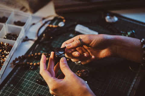 Artisan crafting Viking jewelry pieces