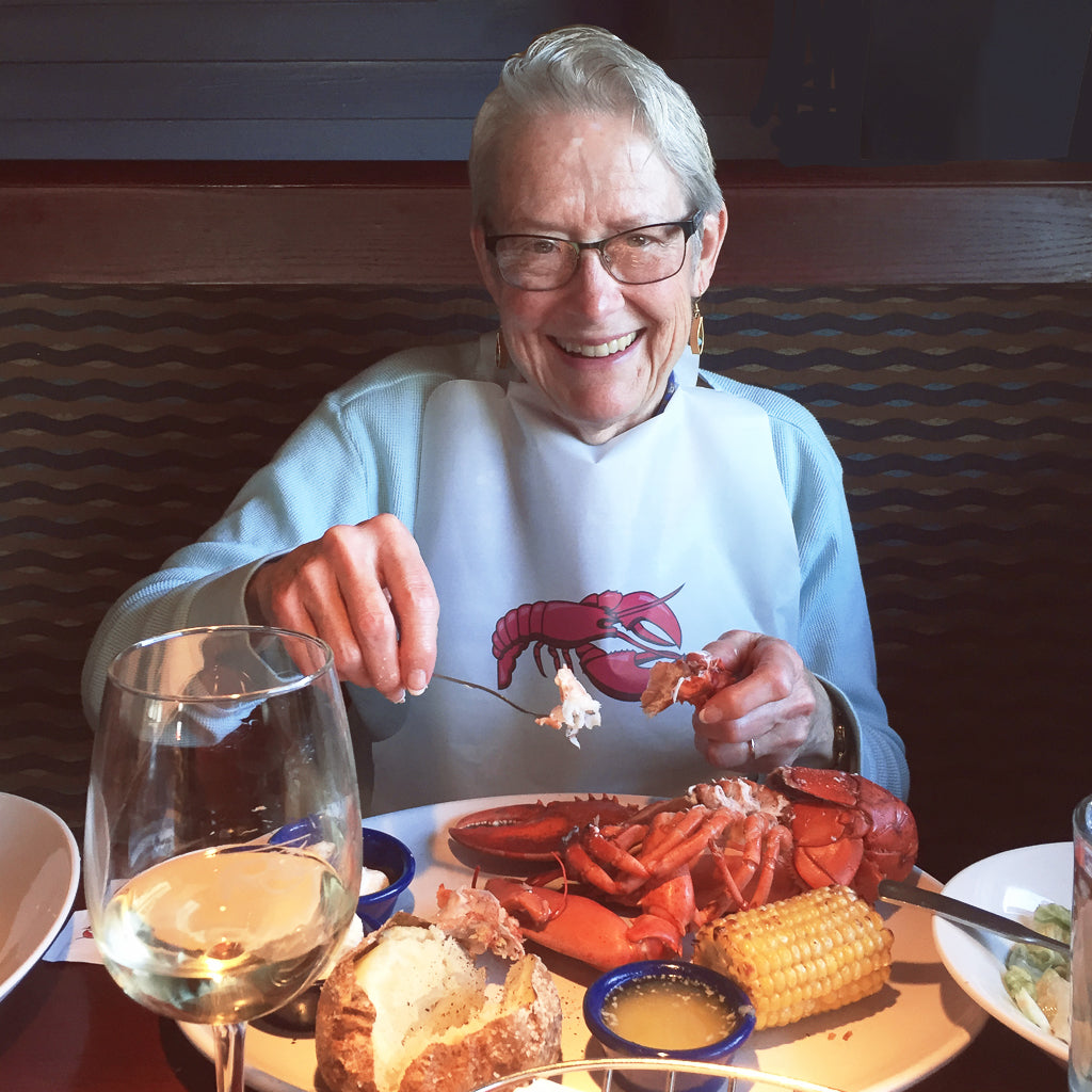 The author Rachel Kroh's mother Betsy Pollak eating lobster