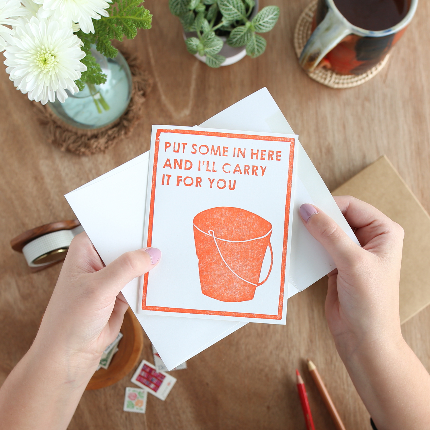 Hands holding put some in here and I'll carry it for you letterpress card