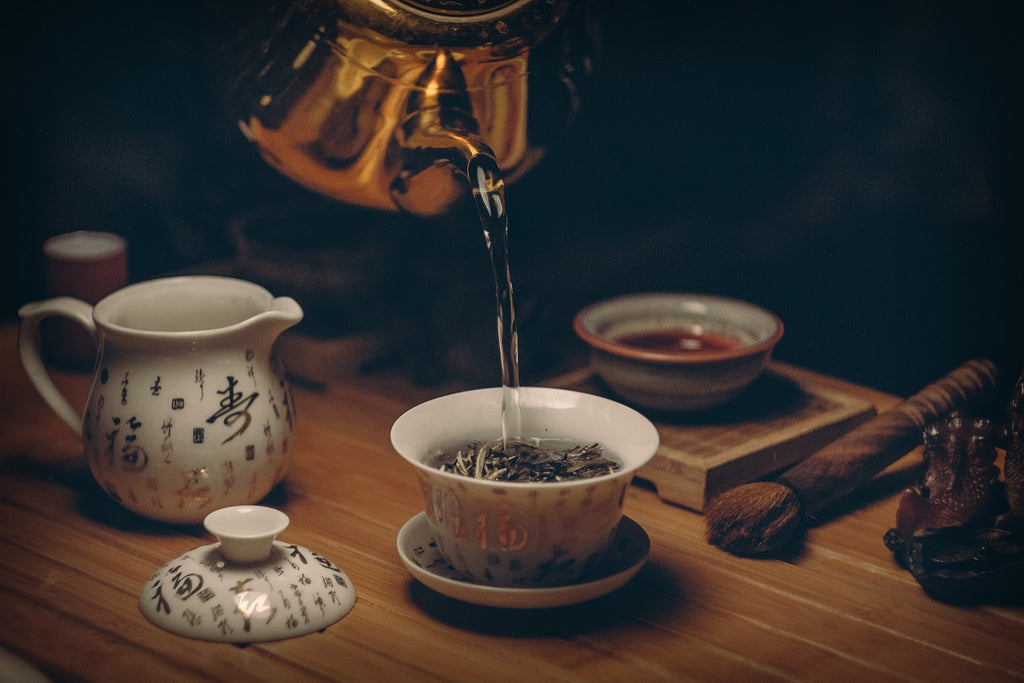 Pouring Tea From a Tea Pot 