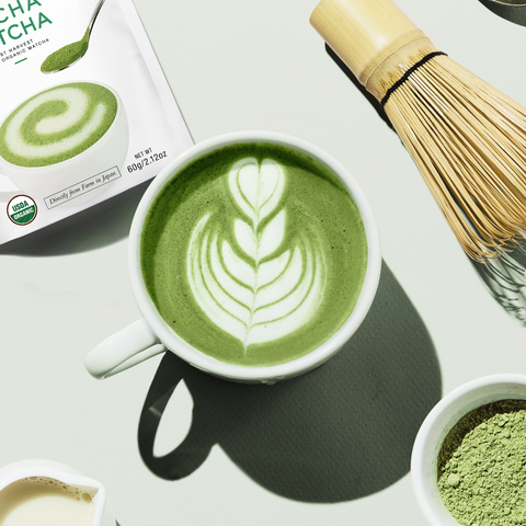 Encha matcha latte with packaging and bamboo whisk