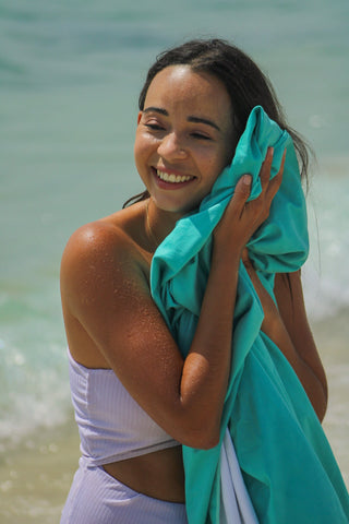 Handy Beach Mat feels soft and can be used as a towel to dry off