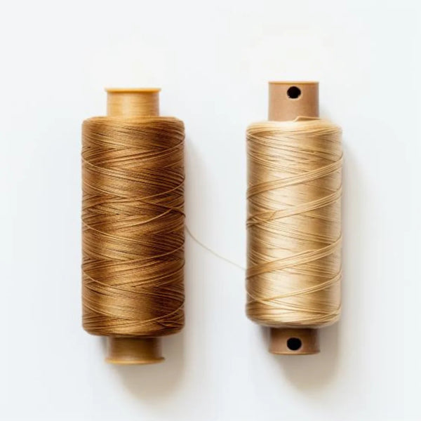 Comparaison visuelle fil de coton et soie tussah