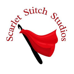 A red flag on a black crochet hook pole. In red text arching above, "Scarlet Stitch Studios" and there is a white background.