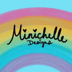 The background is a transparent rainbow. The cursive reads "Minichelle Designs"