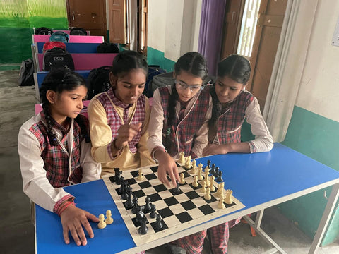 School Students playing chess