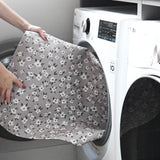 Easy to clean and machine washable Un-Rug accent floor mat fits easily into front load washing machine