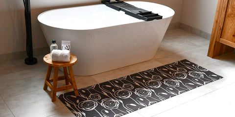 More than a doormat, this machine washable Un-Rug makes an awesome rubber backed bathmat in front of a modern tub.