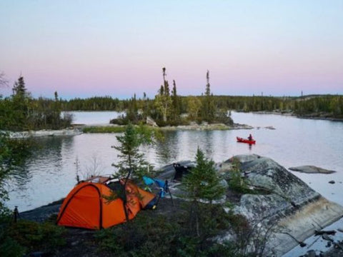 Paddling next to campsite