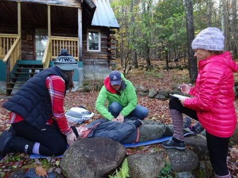 Girls learning wilderness skills