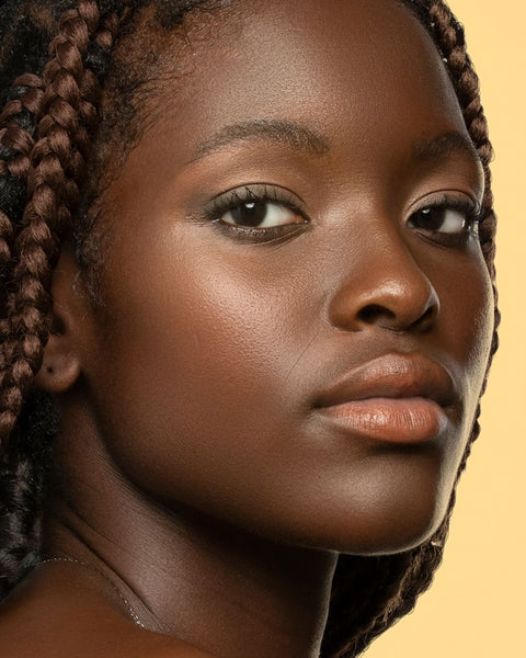 Radiant Black skin model with natural face highlight created using SAPPHO Skin Luminizer