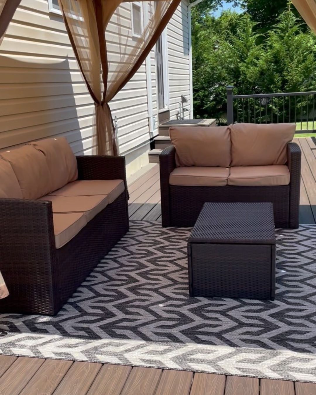  Ample seating, cozy cushions, and a central coffee table create a comfortable space for lounging, and the canopy provides shade for relaxing, even on hot, sunny days. 