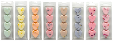 8 packs of wax melts with botanicals in pastel colours. No labels