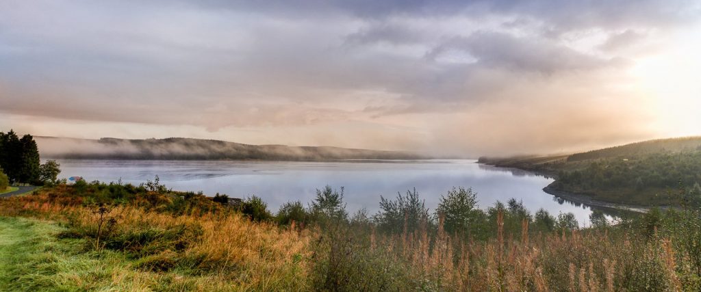 A misty scene over Kielder Forest