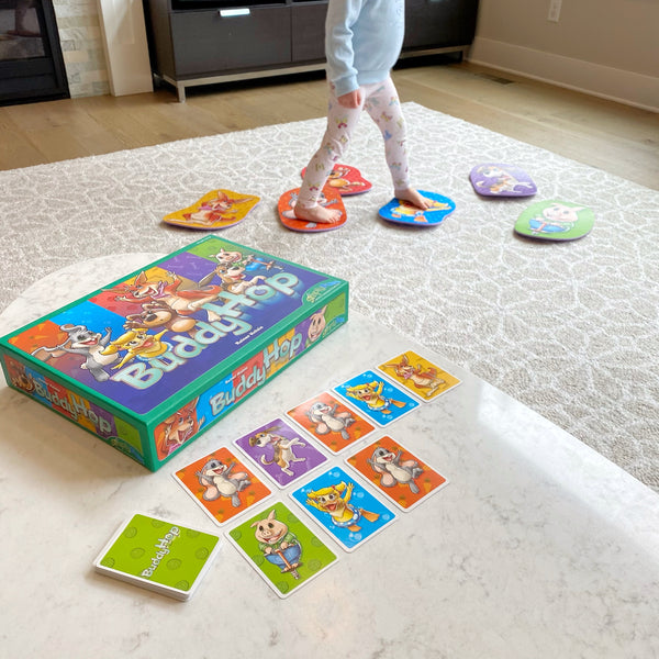 Buddy Hop by SimplyFun is a fun memory and gross motor skills game for ages 4 and up