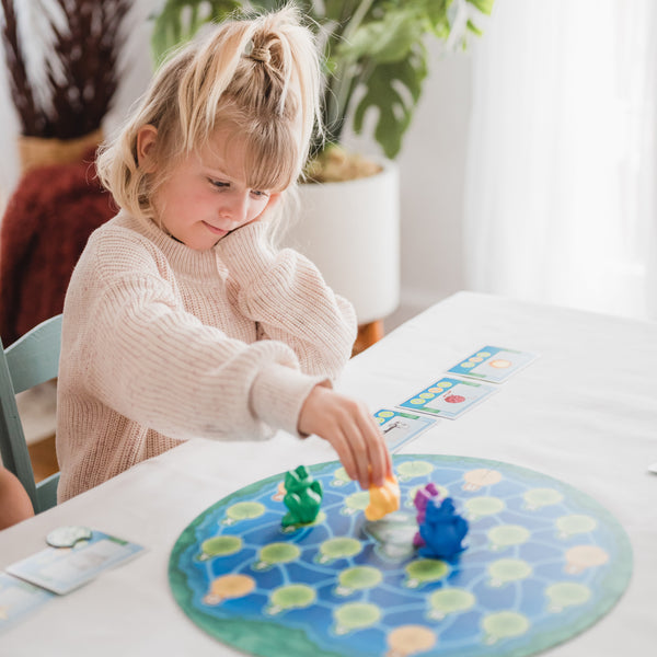 Lily Pond by SimplyFun is a fun early reading game and spelling game for ages 4 and up.