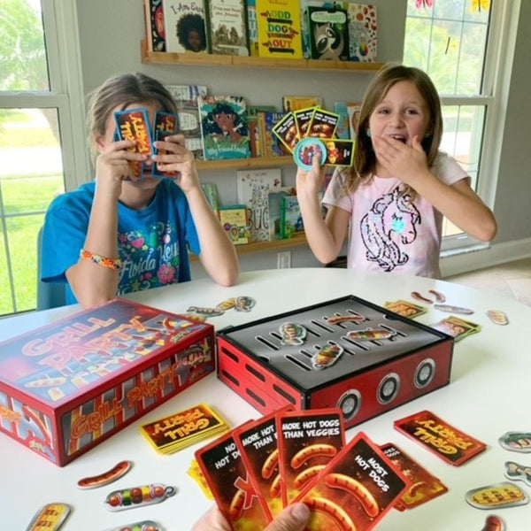 Girls playing bbq themed math game, Grill Party. Best math card games for kids.