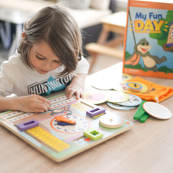 My Fun Day by SimplyFun is a wooden board designed to teach children about the weather, days of the week, months, and more.