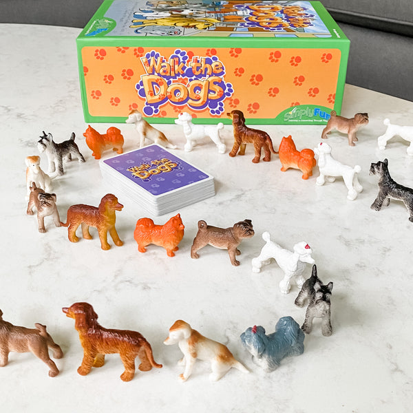 Walk the Dogs by SimplyFun is a math game featuring 63 adorable dogs and focusing on counting and multiplication.