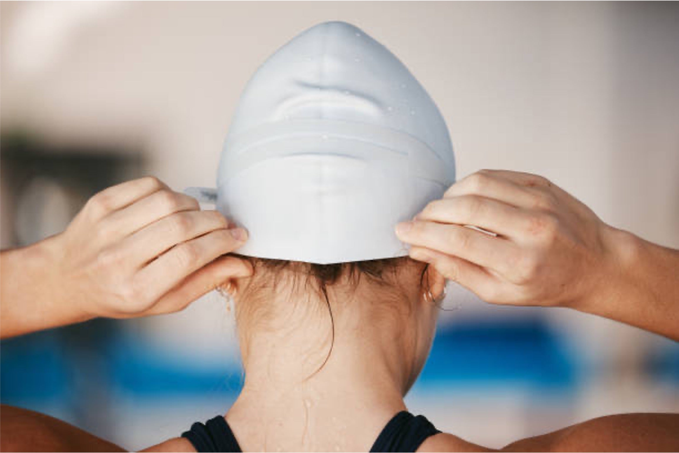 Image of a woman on a silicone swim cap.jpg__PID:f9446779-0df3-49b5-83f2-28b384681665