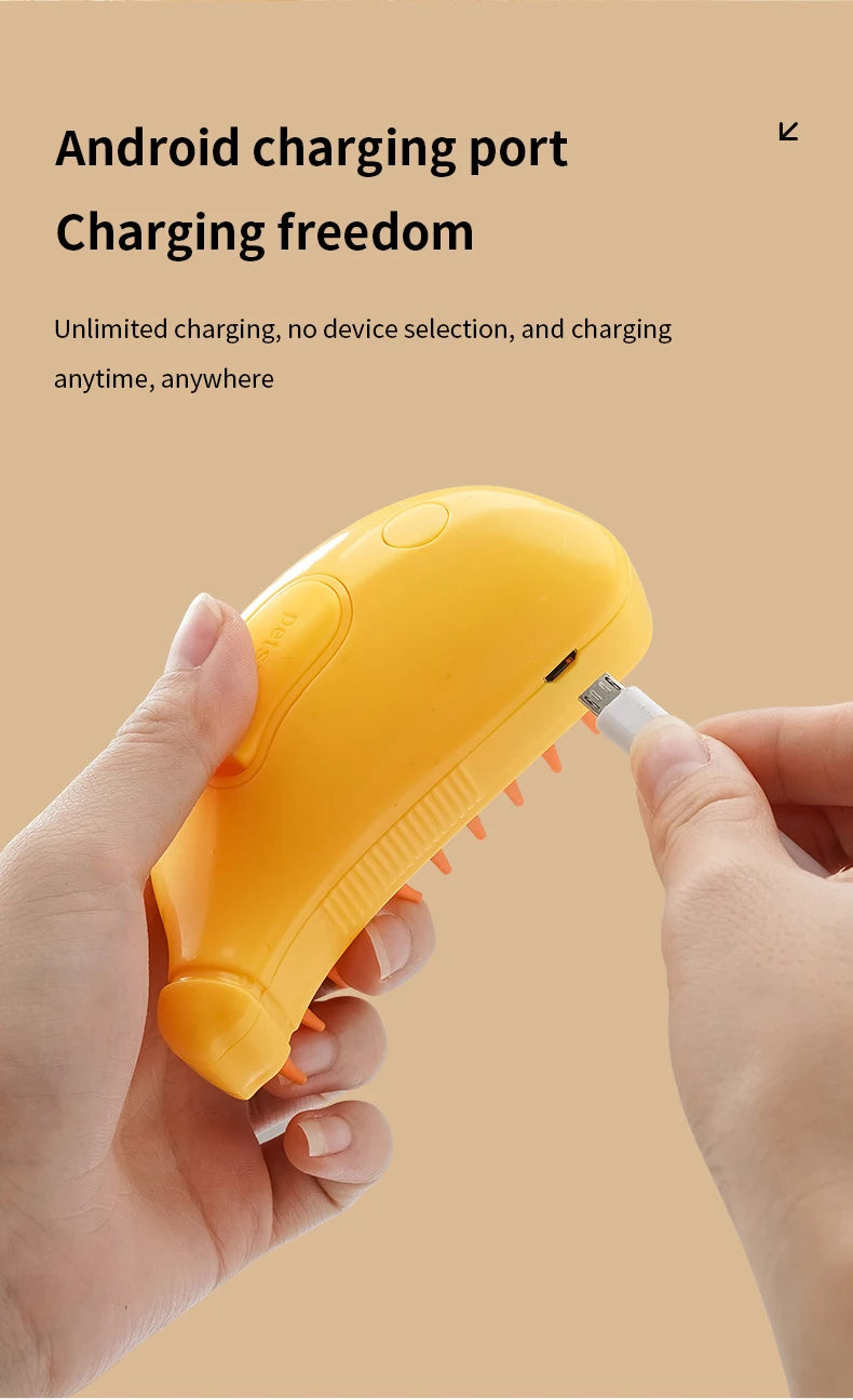 Person holding a yellow device with an Android charging port while inserting a charging cable, reminiscent of preparing **The Stuff Box 3-in-1 Electric Pet Grooming Brush - Cat Steam Brush for Massage, Hair Removal, and More!** for use.
