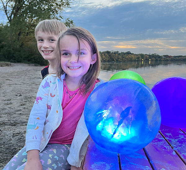 Kids with colored globes