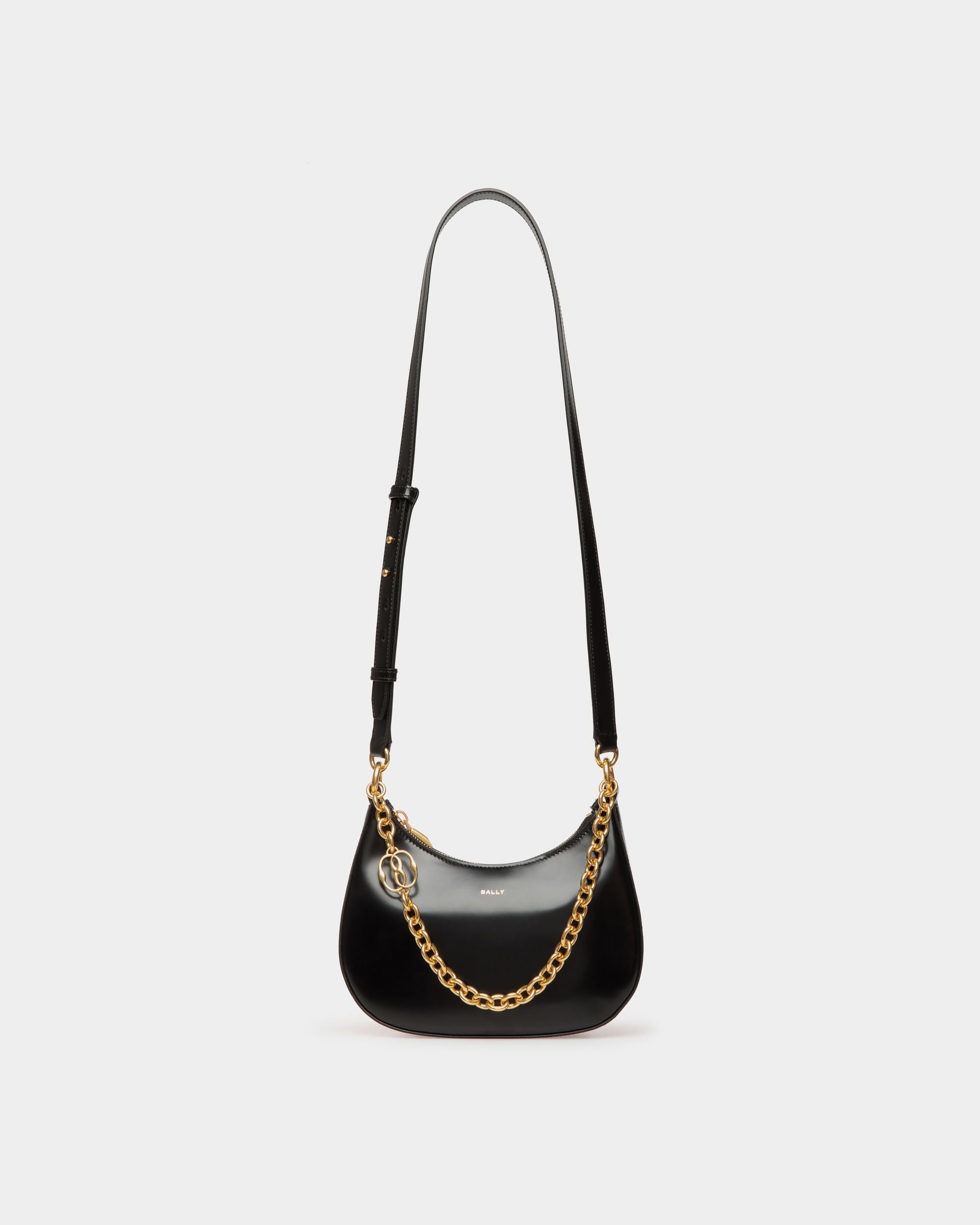 Women's Emblem Mini Crossbody Bag in Black Patent Leather | Bally | Still Life Front