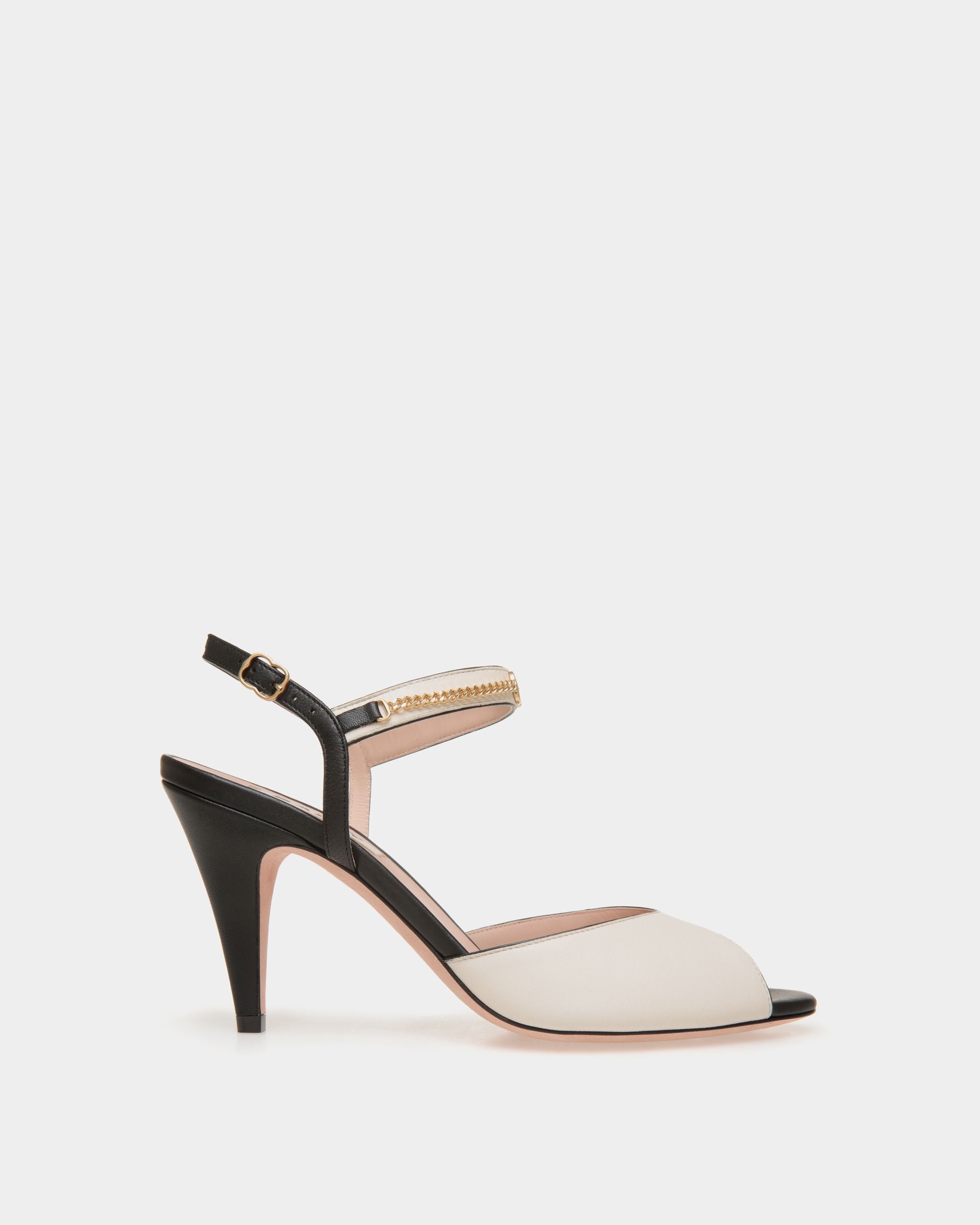 Daily Emblem | Women's Heeled Sandal in Black and White Leather | Bally | Still Life Side