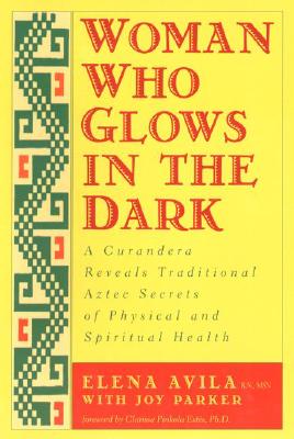 in image of the book cover for Woman Who Glows In The Dark - yellow background with green and red angular designs on the left.