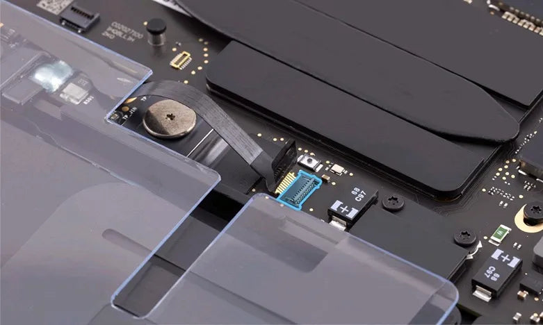 Close-up of a MacBook Pro's internal circuitry, highlighting the BMU connector circled in blue