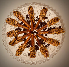 Granolala Pretzel Rods on circular glass plate