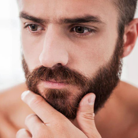 man wondering about beard growth