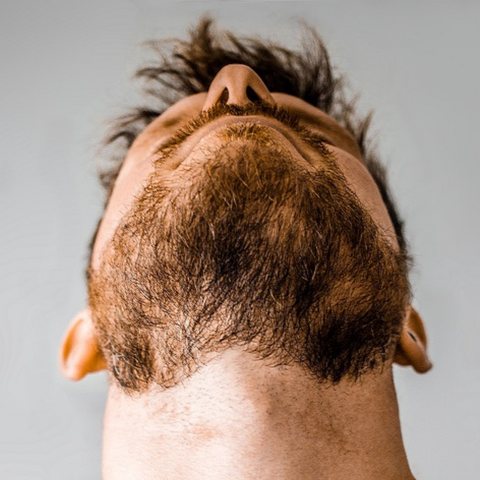 man showing off scruffy neckline