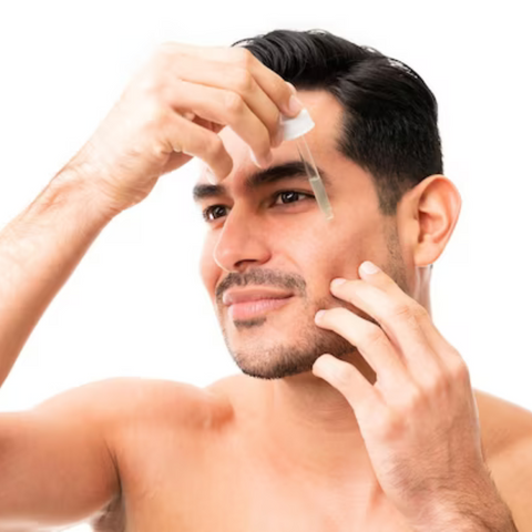 man applying serum